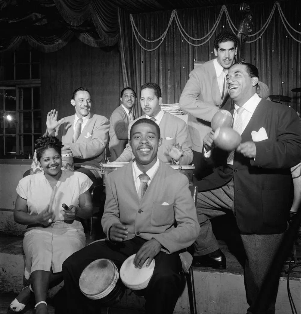 Graciela, José Mangual on bongó and the band around Machito, Glen Island Casino, 1947. William P. Gottlieb