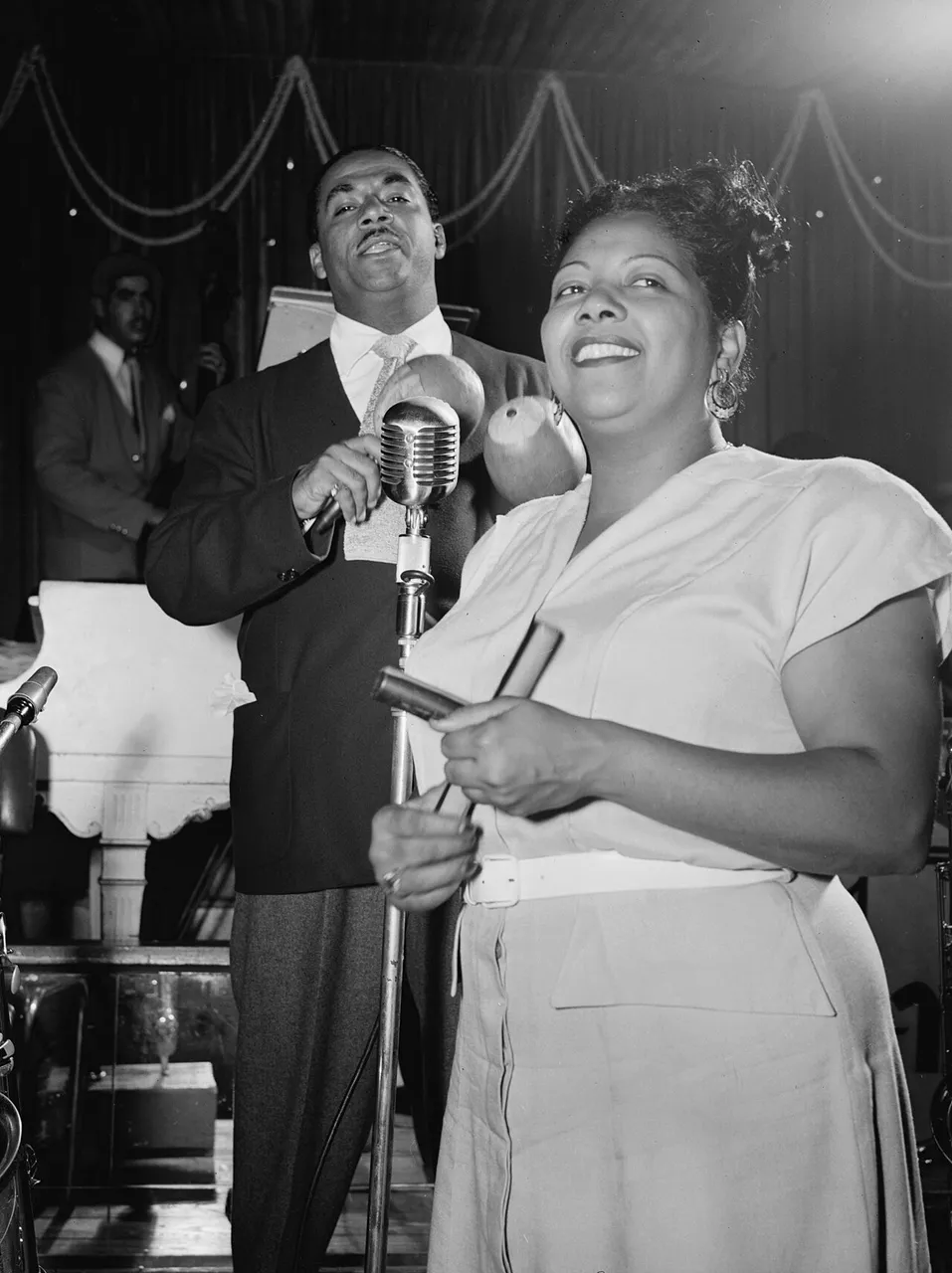 Machito and Graciela at the microphone, Glen Island Casino, New York, 1947. William P. Gottlieb, Library of Congress